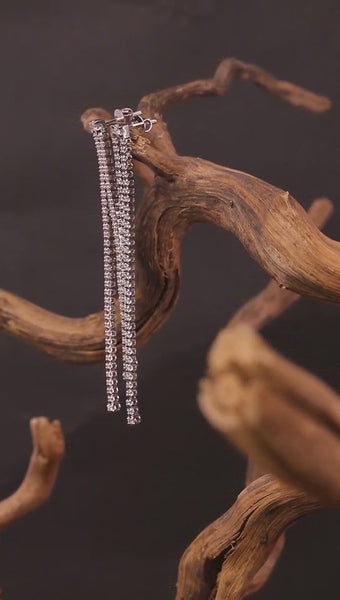 Beautiful 18ct gold diamond drop studs cocktail style