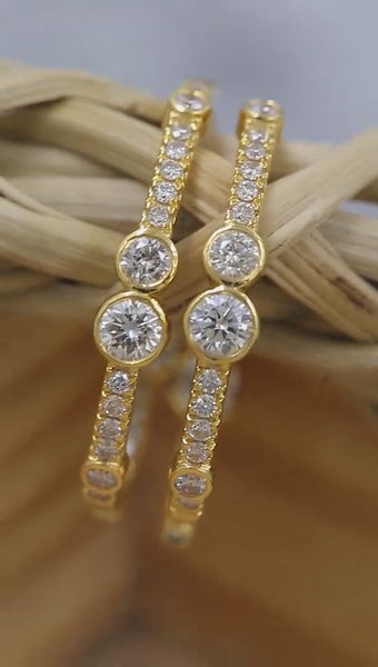 Stylish yellow gold diamond bubble hoop pair