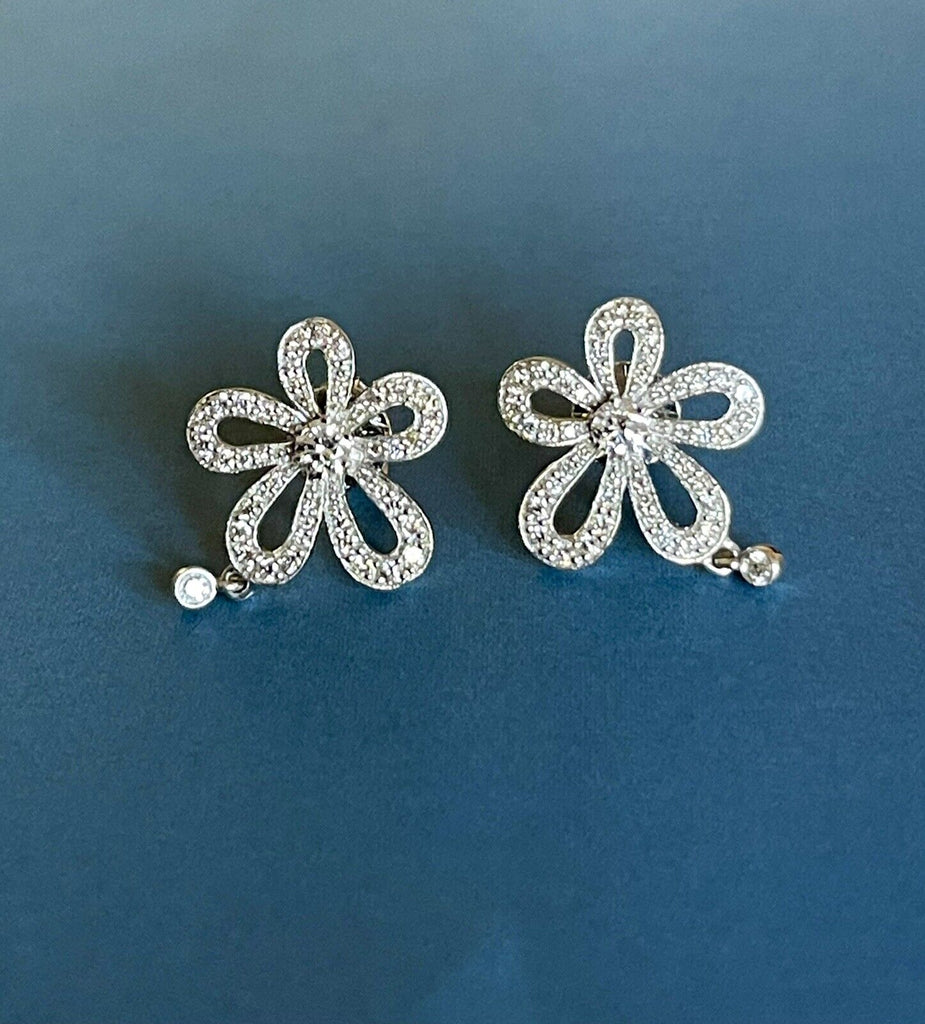 18ct white gold diamond earrings, flower charm